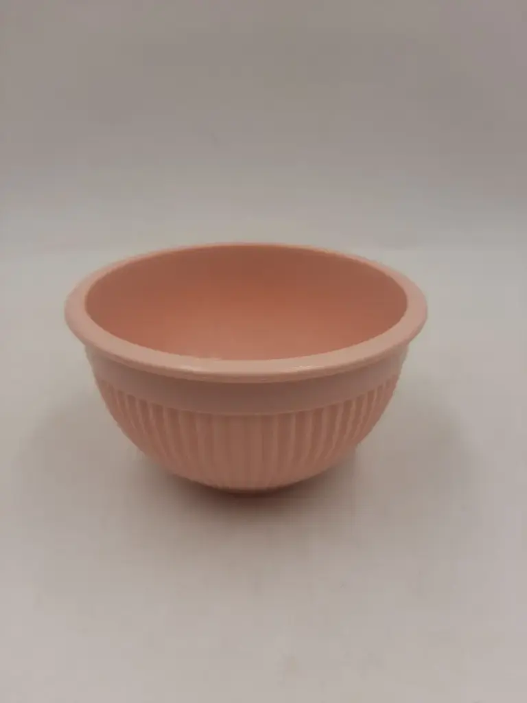Small round colored bowl with a rim